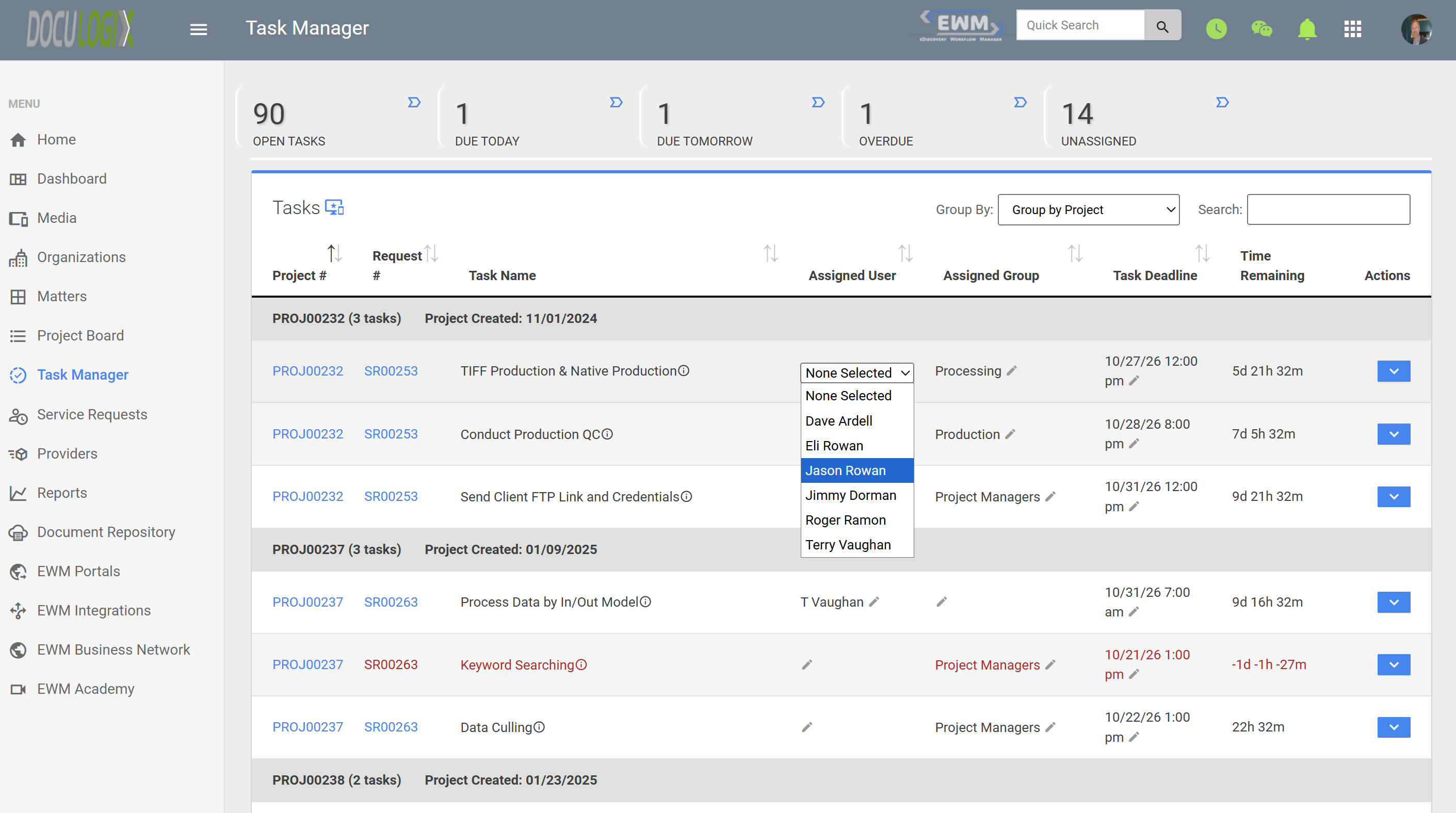 Doculogix Task Manager showing open, due today, due tomorrow, overdue, and unassigned task counts above a project-grouped task list, with the assigned user dropdown open to reassign a task